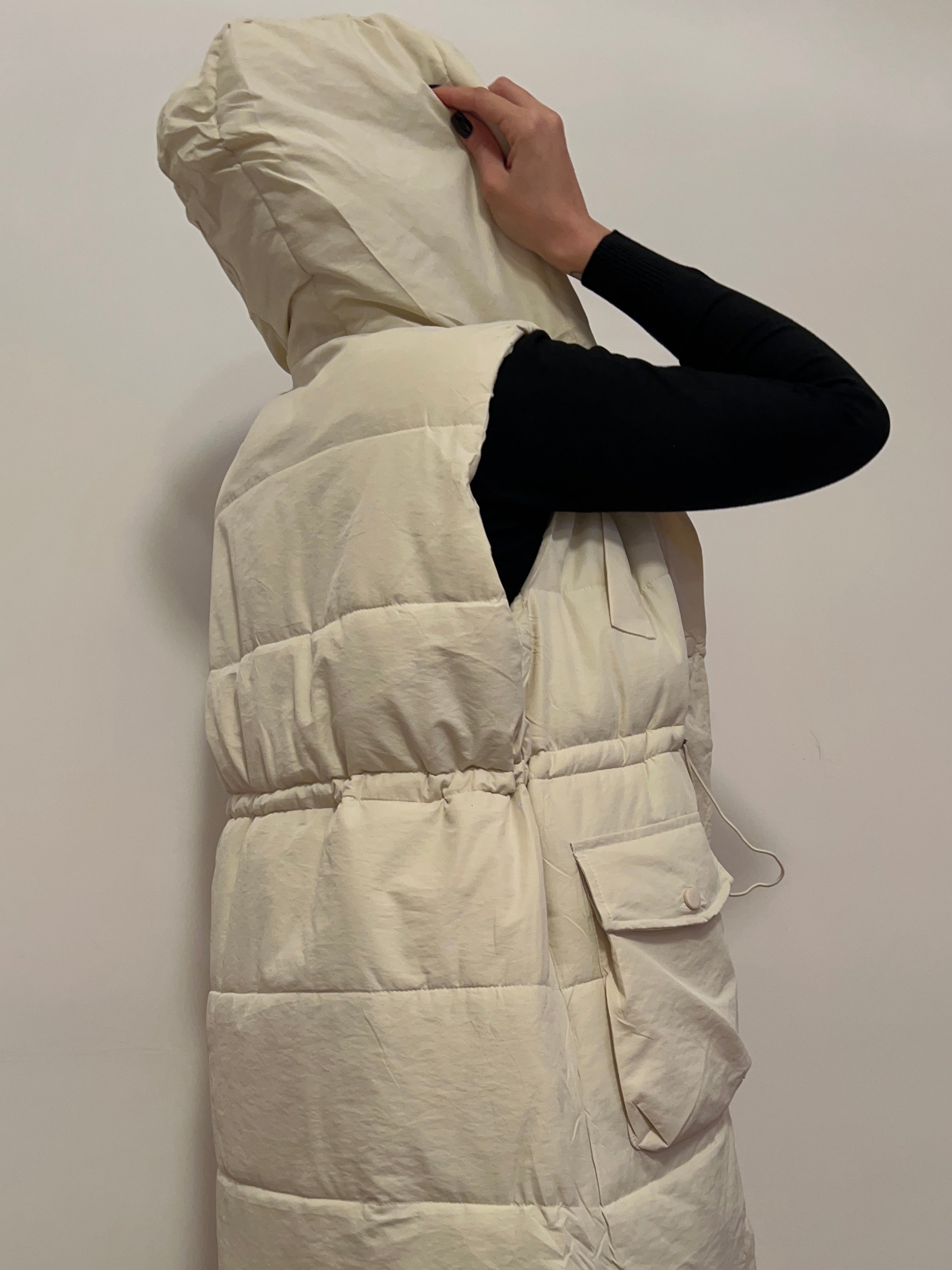 Piumino smanicato panna